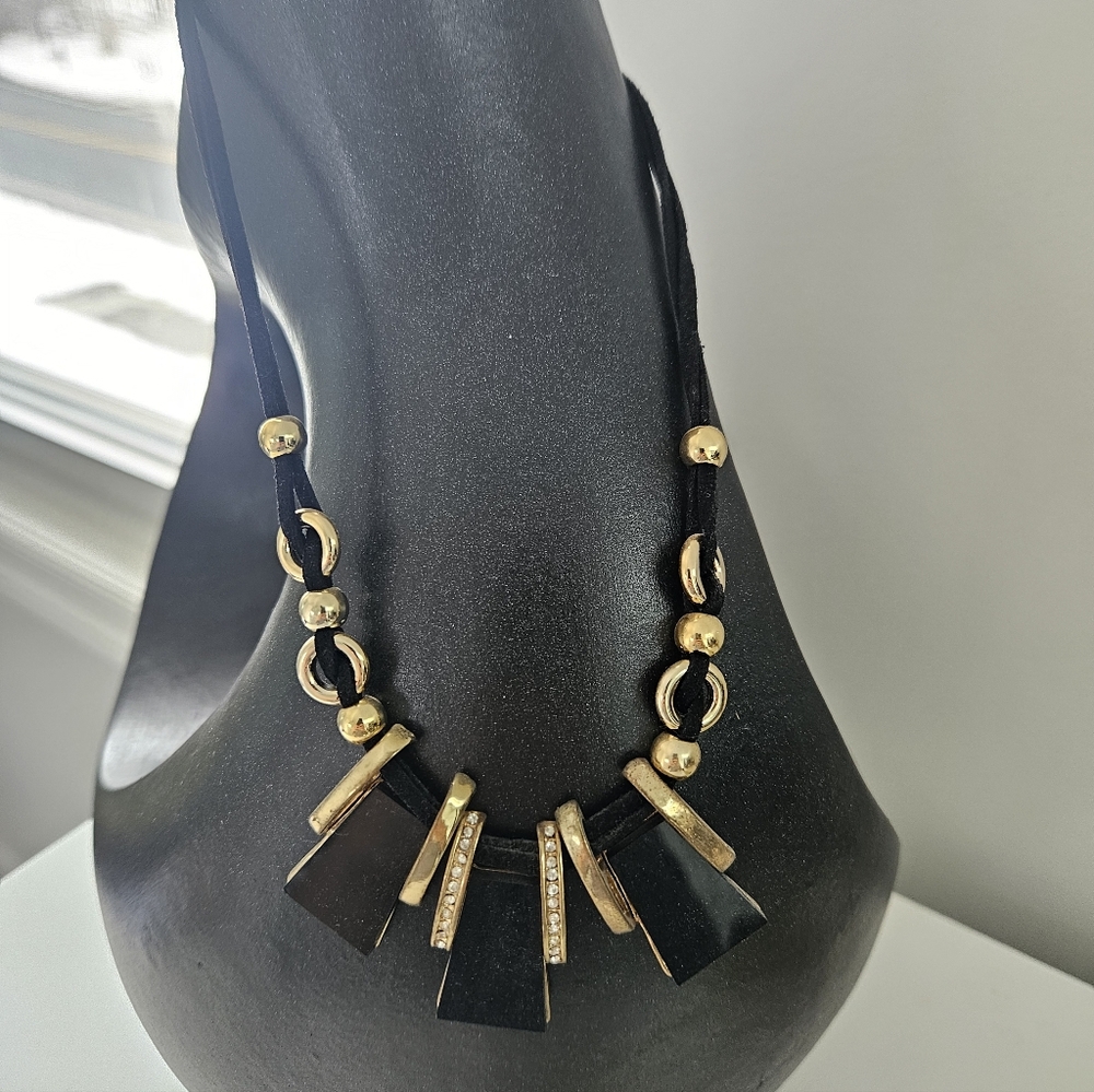 Elegant Gold and Black Necklace